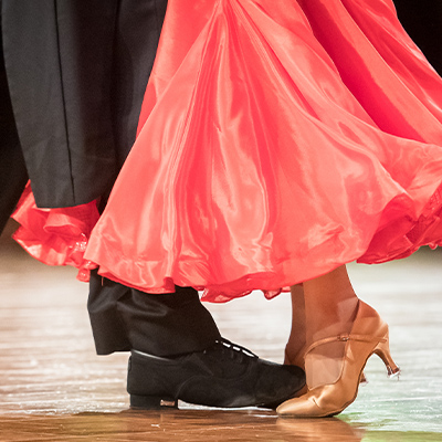 Photo of the lower legs of two people dancing